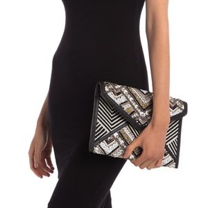 Wonder Leo Multi Metallic Black Clutch